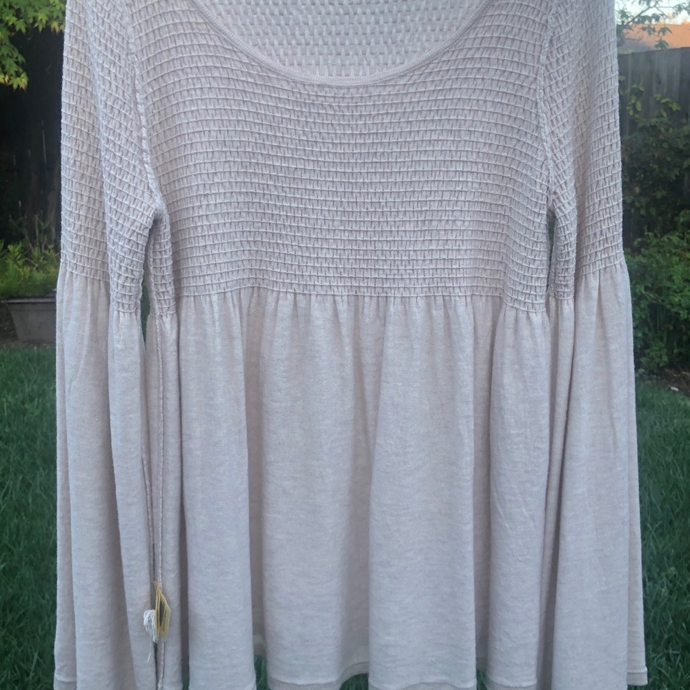 Beautiful bell sleeves sweeter top